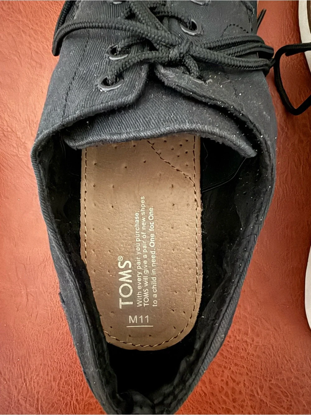 Toms Black Canvas Oxfords with Brown Trim